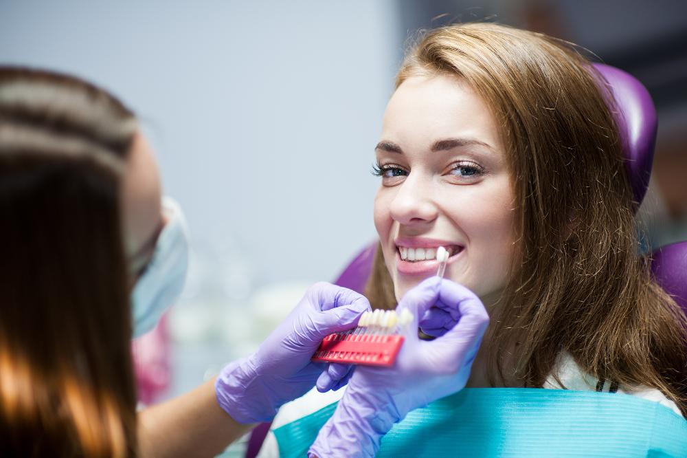 woman picking tooth whitening shade | teeth whitening cheshire ct