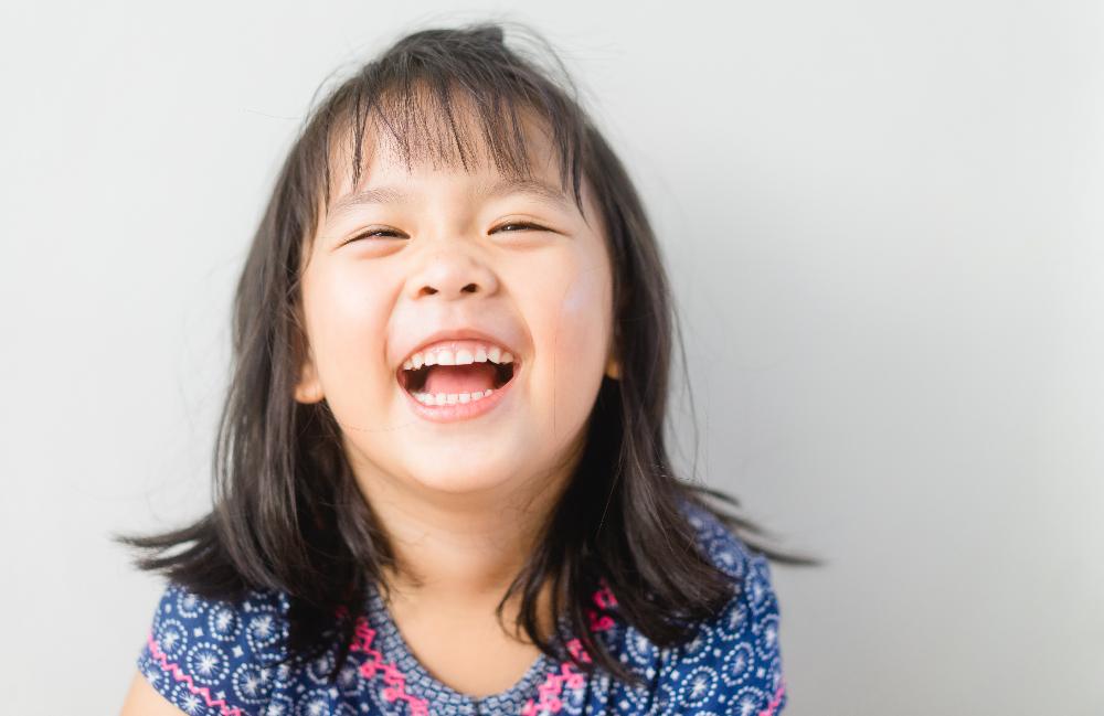asian small girl smiling | childrens dentist near me
