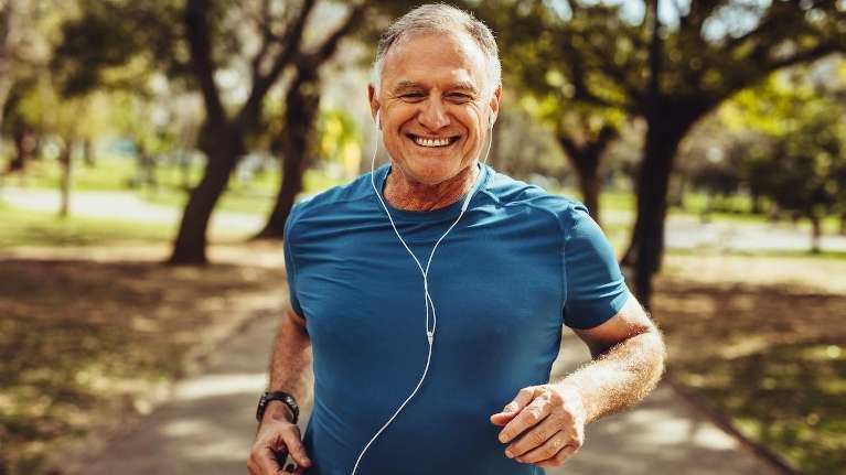 older man running outside | cheshire dentist