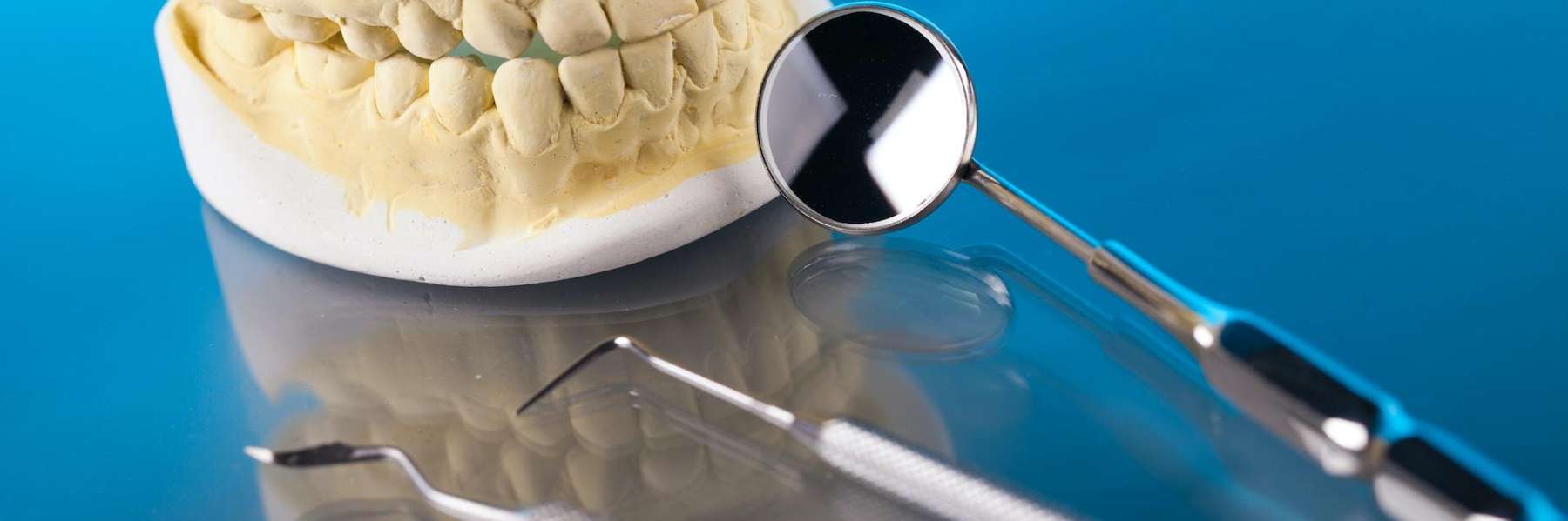close up of mouth mold with dental tool | childrens dentist cheshire ct
